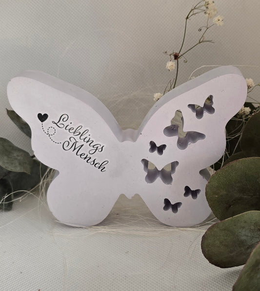 Schmetterling mit Schriftzug